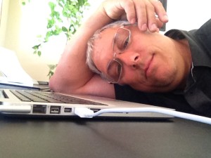 Dean Exhausted at Macbook